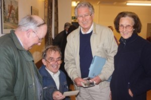 lderman cousins looking at photos  John Price, Philip Alderman, Chris Gurnett, Margaret Rees (nee Gurnett)